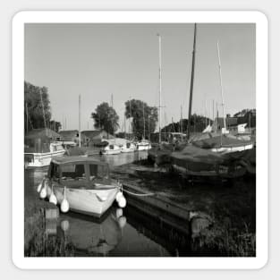 Boats moored at a harbour near Hickling Broad, Norfolk, UK Sticker